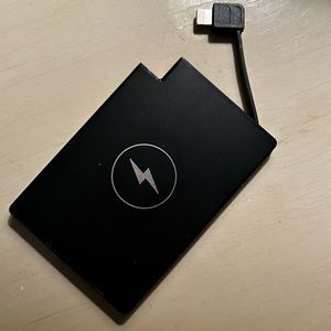 Clutch Apple iPhone charger.